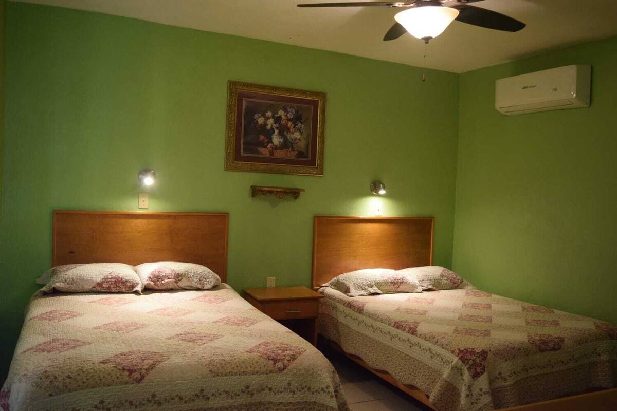 Minibar, iron/ironing board (on request), WiFi (free), bed sheets