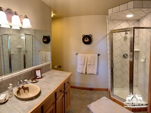 Bathtub, hair dryer, towels, soap