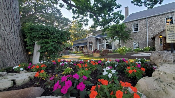 A stone building with a pet-free, smoke-free, and tobacco-free environment sign. - Buckeye Bungalow charming and cozy cottage, close to everything  (Port Clinton)