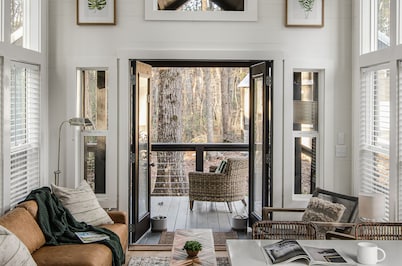 Enjoy the lake & mountain retreat at The Water & Woods Tiny Home