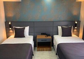 Ropa de cama de alta calidad, colchones Select Comfort y minibar 