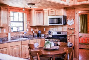 Fridge, microwave, oven, stovetop - Texas Sun Cabin: Eight Acres with Trails and Amazing Sunset Views (Graham)