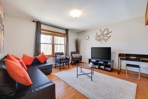 Smart TV, fireplace, books