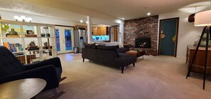 Smart TV, fireplace, books