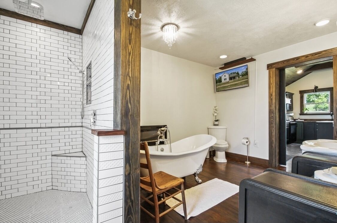 Bathtub, hair dryer, towels, soap