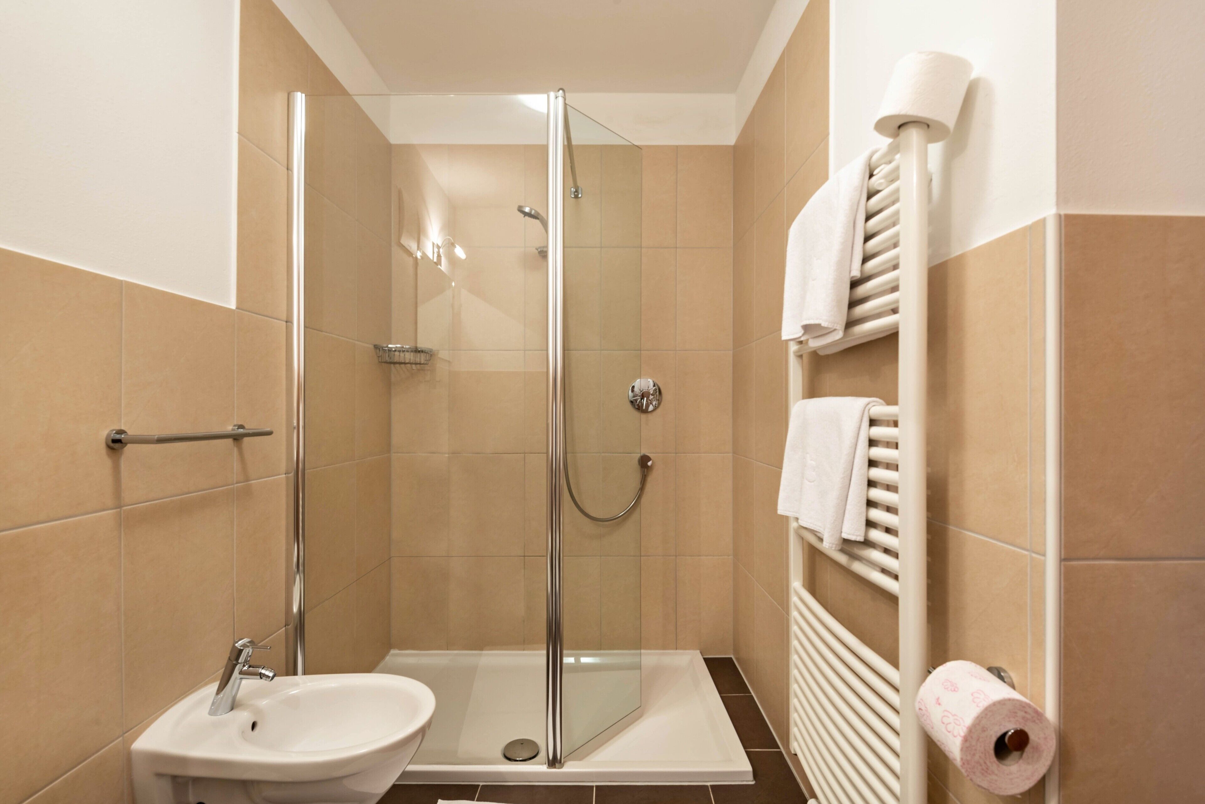 Bathtub, hair dryer, towels