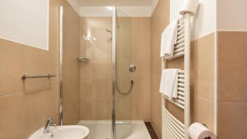 Bathtub, hair dryer, towels