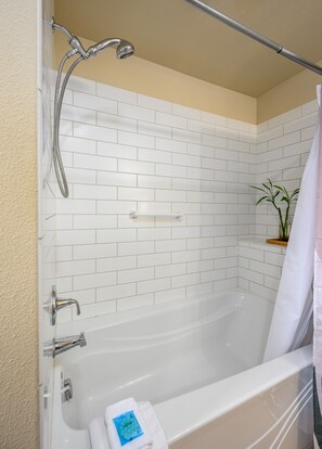 Combined shower/bathtub, hair dryer, towels, soap
