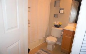 Combined shower/tub, towels, soap, toilet paper