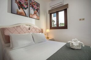 1 chambre, coffres-forts dans les chambres, fer et planche à repasser