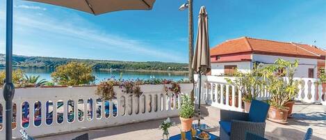 Apartment (One Bedroom Apartment with shared Ter) | Terrace/patio