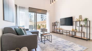 Apartamento | Área de estar | TV de tela plana 26 polegadas com canais a cabo, TV