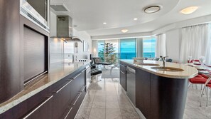 Fridge, microwave, oven, stovetop - Sirocco 608 by G1 Holidays - Two Bedroom Beachfront Oceanview Apartment in Sirocco Resort (Mooloolaba)