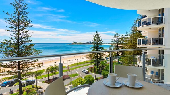 Outdoor dining - Sirocco 608 by G1 Holidays - Two Bedroom Beachfront Oceanview Apartment in Sirocco Resort (Mooloolaba)
