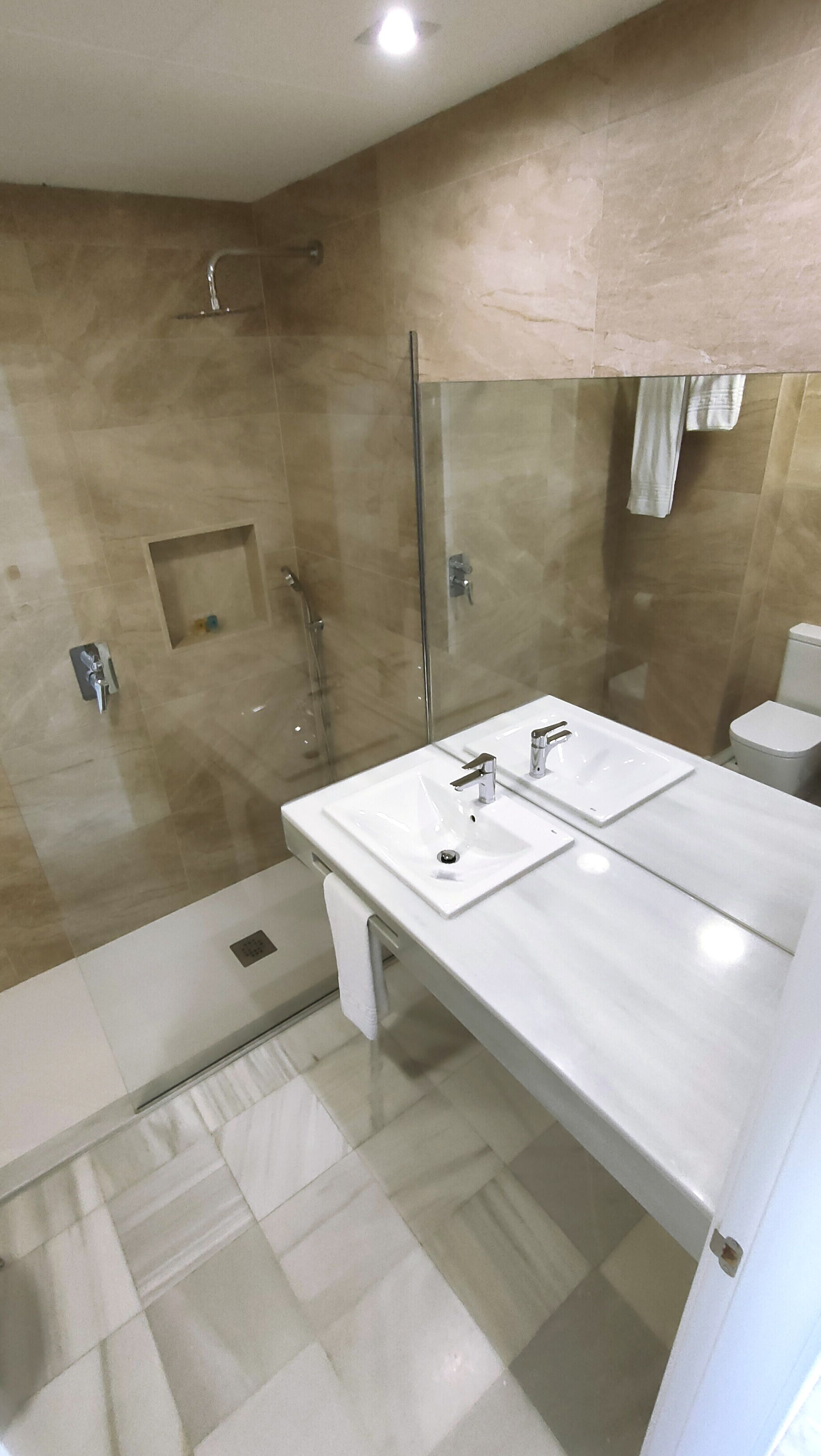 basic double room single use | bathroom | shower, rainfall showerhead, free toiletries, hair dryer