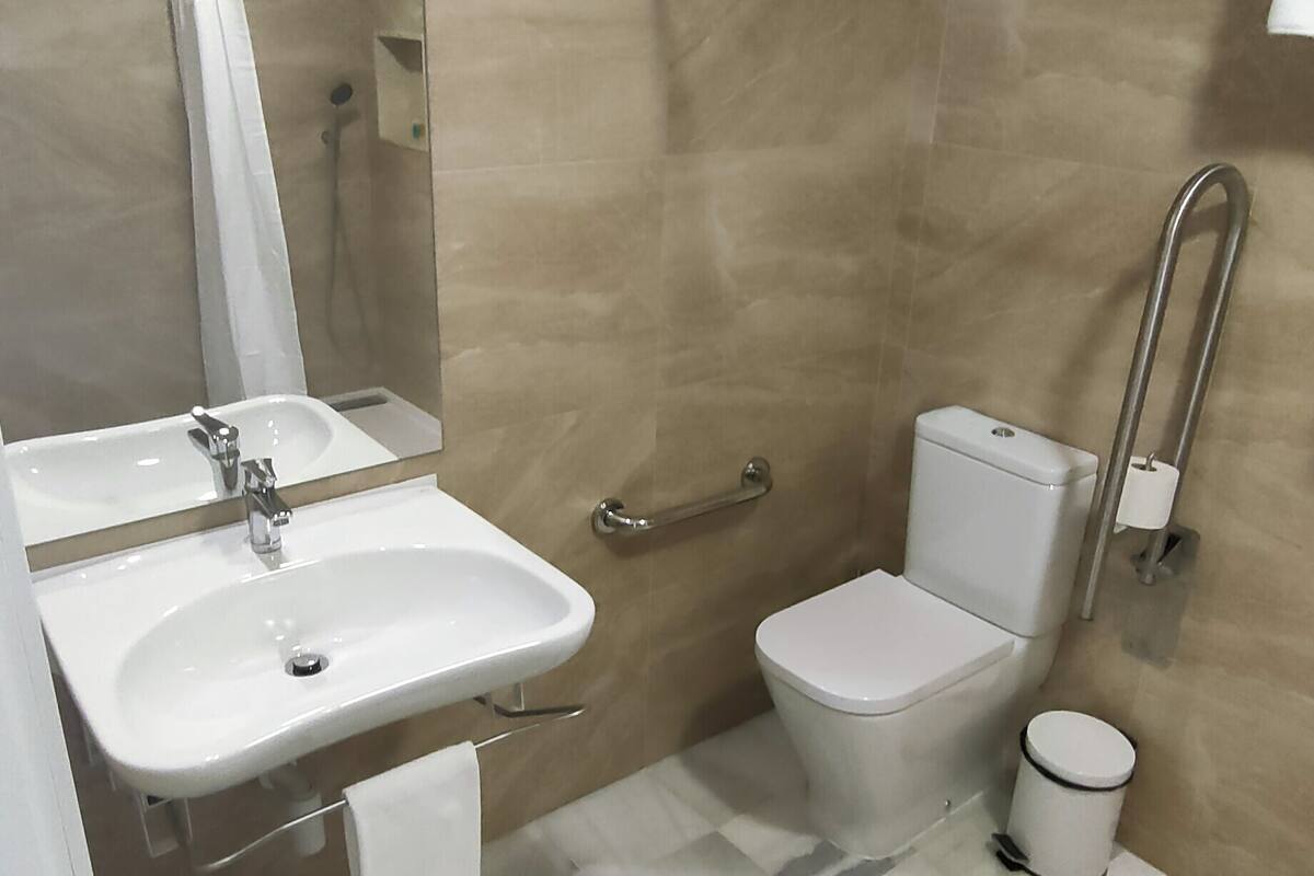 basic double room single use | bathroom | shower, rainfall showerhead, free toiletries, hair dryer