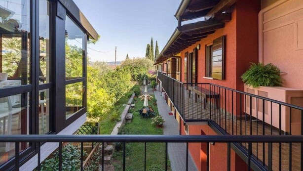 Unclassified image, 1 of 49, button - Home with garden for your family and pets (Toscolano Maderno)