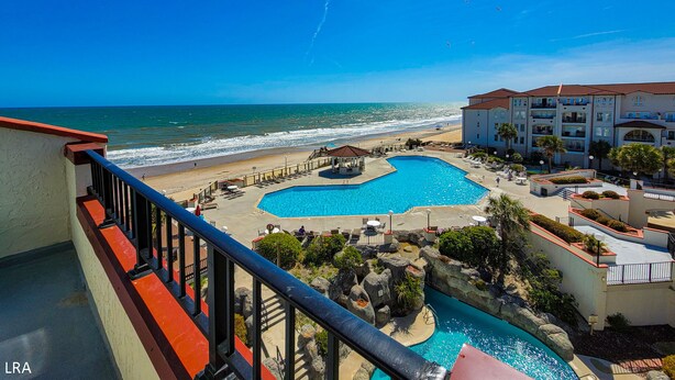 A resort with a pool, beach, and ocean view. - 411-B Villa Capriani: Ocean Views & Beach Bliss! (North Topsail Beach)