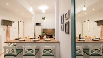 Comfort Apartment | Private kitchen | Full-sized fridge, microwave, oven, toaster