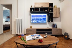 Comfort Apartment | Living area | 48-inch Smart TV with digital channels, TV, Netflix - Blue Ark Comfort near Acropolis (Athens)