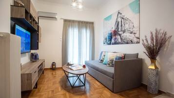 Comfort Apartment | Living area | 48-inch Smart TV with digital channels, TV, Netflix