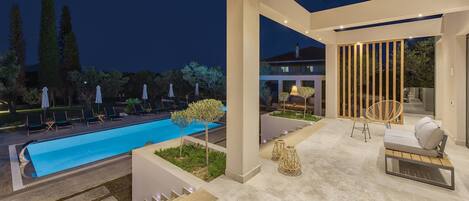 Outdoor pool, pool umbrellas, pool loungers