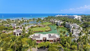 A resort with multiple buildings, a golf course, and a marina. - 2 BDRM Mauna Lani Terrace Condo - Steps to Beach! (Kamuela)