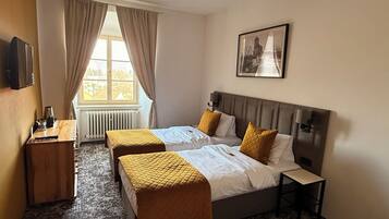 Double Room (extra bed) | Blackout drapes, cribs/infant beds, free WiFi, bed sheets