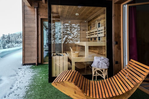 Kitzbüheler Almhütte mit privater Panoramasauna
