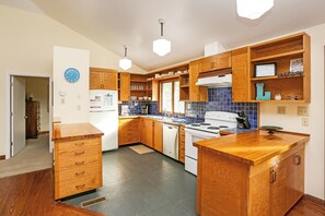 Fridge, microwave, oven, cookware/dishes/utensils