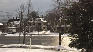 A residential street with houses, some with snow on the roofs and ground. - Maple Suite- Private  Ground Floor Apartment in front of Smith College (Northampton)