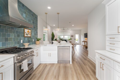 Brand new 4 bedroom with 2  master suites and pool, steps to the beach.