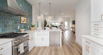 Brand new 4 bedroom with 2 master suites and pool, steps to the beach.