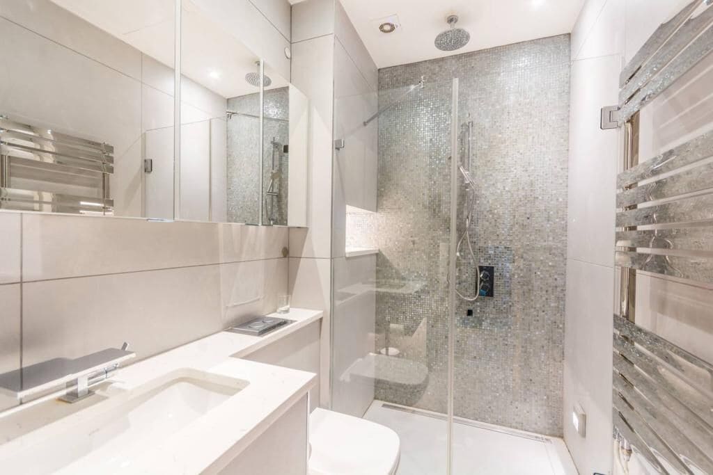 Bathtub, hair dryer, towels, soap