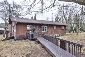 Terrace/patio - Lakeside wilderness resort cabin with dock, fire pit, on-site store, bait shop! (Watersmeet)