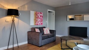 Apartment, 1 Queen-Bett und Schlafsofa | Wohnzimmer