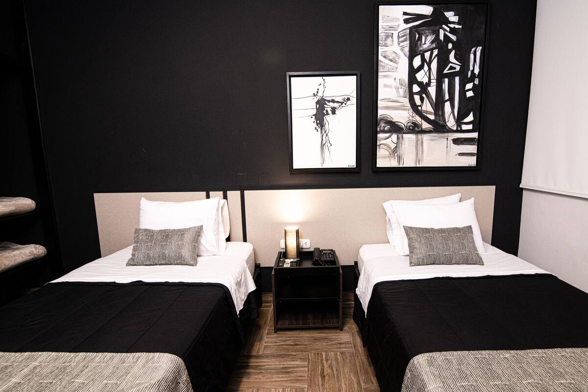 Basic Twin Room | Down comforters, desk, iron/ironing board (on request), WiFi (free)