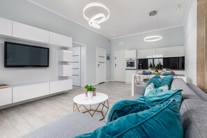 Apartamento premium | Cozinha privada | Geladeira, cooktop, cafeteira/chaleira, chaleira elétrica