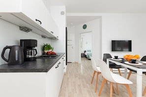 Lägenhet Grand | Eget kök | Kylskåp, spishäll, kaffe- och tebryggare och vattenkokare