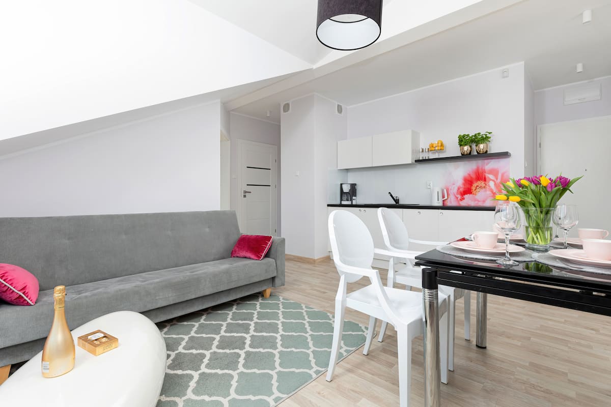 Luxury Apartment | Living area | 42-inch flat-screen TV with satellite channels, TV