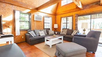 Windchimes Cabin | Living area | Flat-screen TV