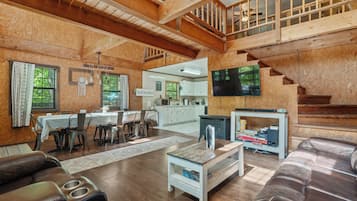Windchimes Cabin | Living area | Flat-screen TV