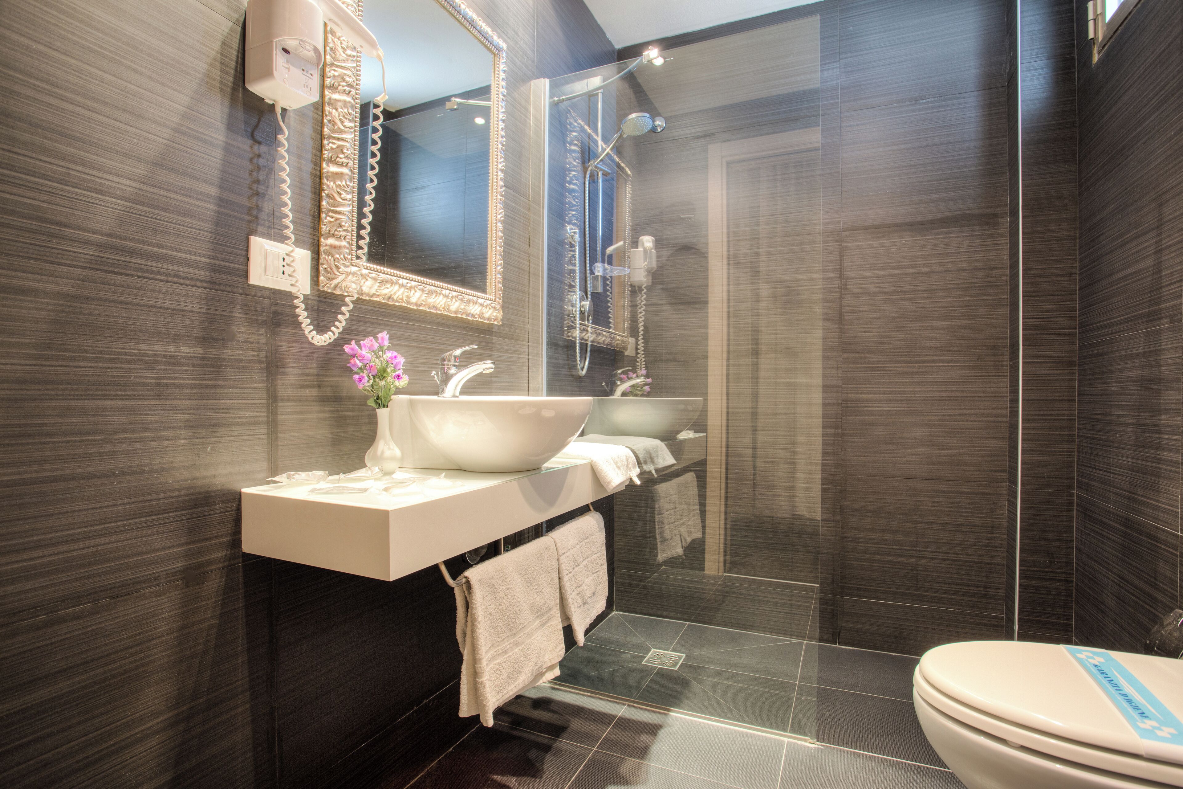 Shower, rainfall showerhead, free toiletries, hair dryer
