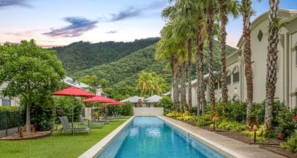 Walk to Palm Cove Beach & Resort Pools | Calypso