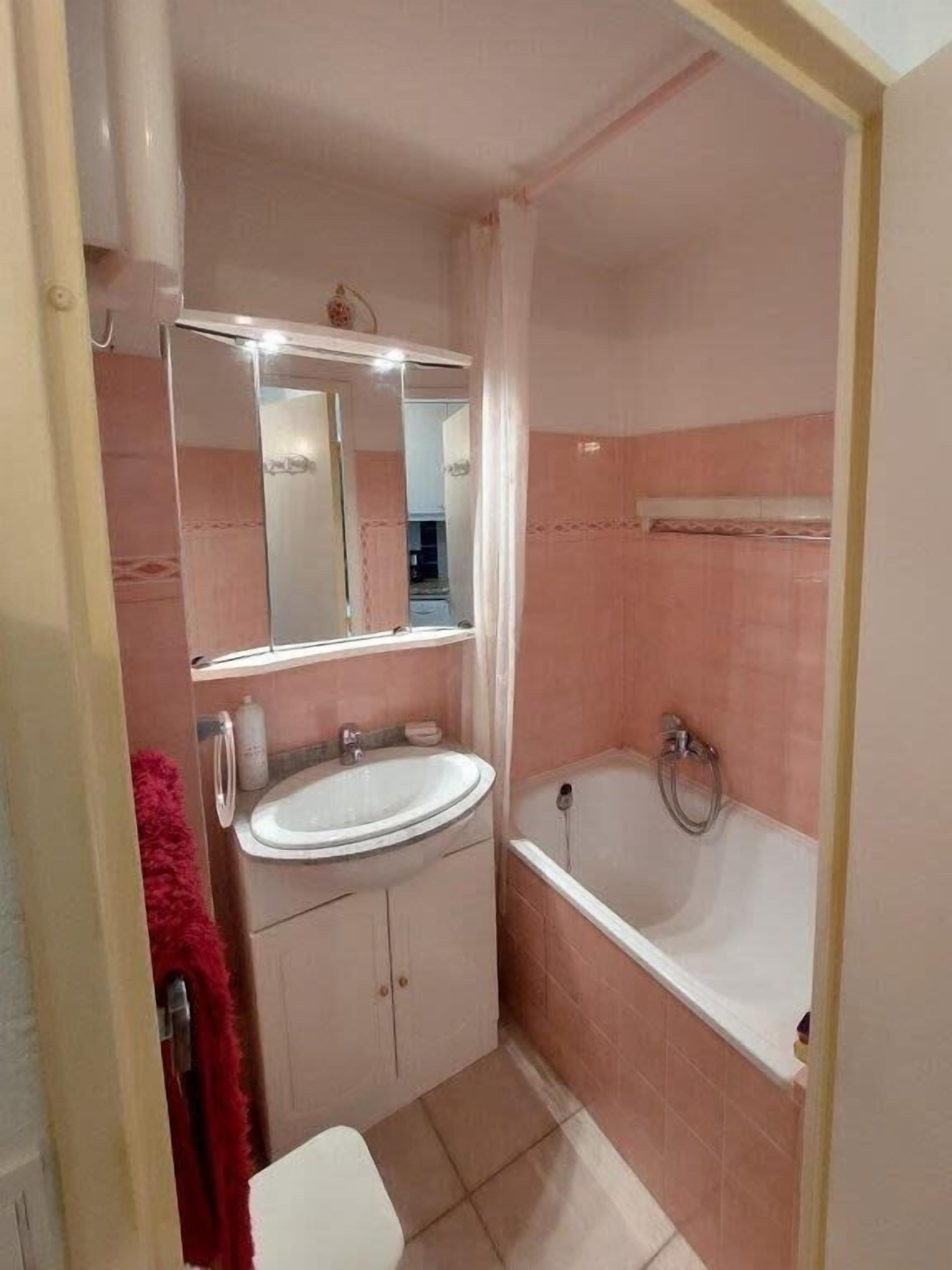 Bañera, secador de pelo