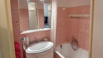 Bañera, secador de pelo