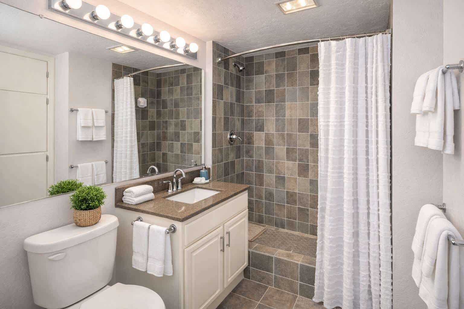 Bañera, artículos de higiene personal gratuitos y secador de pelo