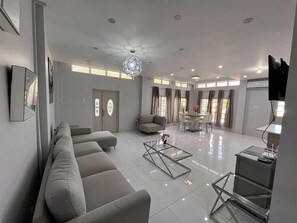 Luxurious entry way and spacious living areas