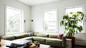Superior Studio Suite, 1 King Bed, Corner | Living area | 32-inch flat-screen TV with cable channels, TV