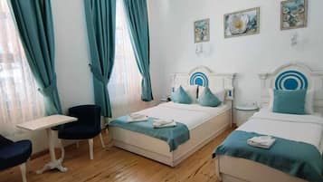 Family Double Room | Minibar, desk, free cribs/infant beds, rollaway beds